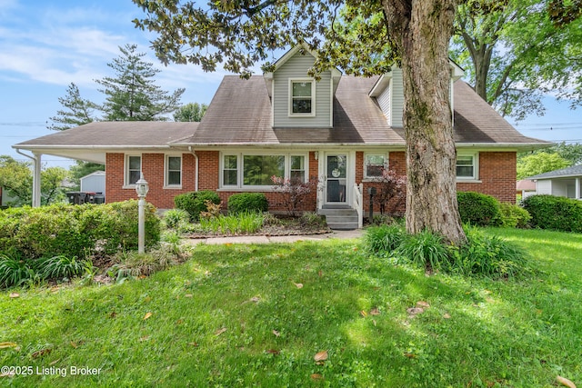 2807 Alice Ave, Louisville, KY 40220 - cape cod-style house featuring a front lawn and brick siding