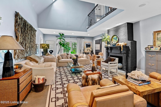 9790 Shelbyville Rd, Simpsonville, KY 40067 - living room with high vaulted ceiling, wood finished floors, a brick fireplace, and recessed lighting