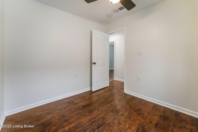 2548 Broadway St, New Albany, IN 47150 - empty room with dark wood finished floors, visible vents, baseboards, and ceiling fan
