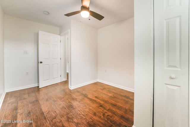2548 Broadway St, New Albany, IN 47150 - unfurnished bedroom featuring ceiling fan, baseboards, and wood finished floors