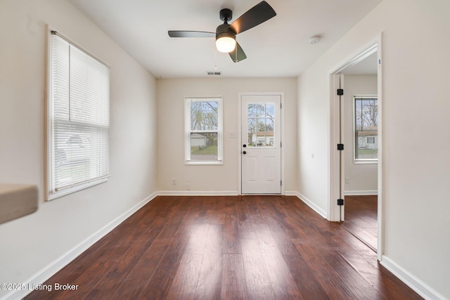 2550 Broadway St, New Albany, IN 47150 - entrance foyer featuring visible vents, a ceiling fan, baseboards, and dark wood-style flooring