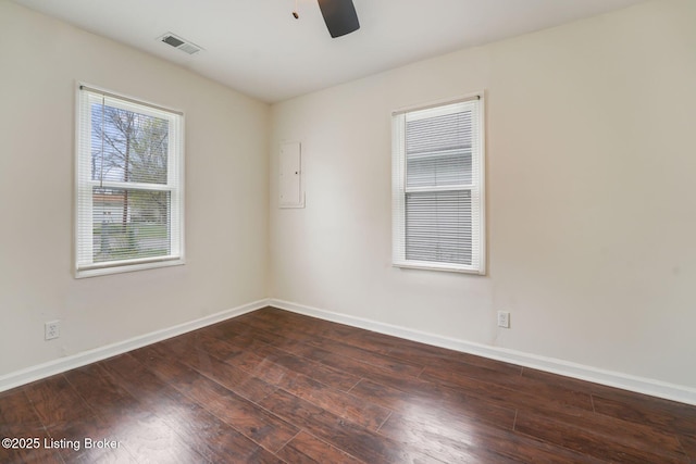2550 Broadway St, New Albany, IN 47150 - unfurnished room featuring hardwood / wood-style floors, baseboards, visible vents, and ceiling fan