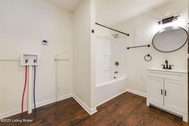2550 Broadway St, New Albany, IN 47150 - full bathroom with vanity, baseboards, shower / washtub combination, and wood finished floors
