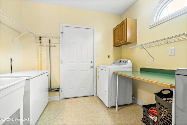 5502 Highpoint Dr, Crestwood, KY 40014 - laundry room featuring independent washer and dryer, cabinet space, and light flooring