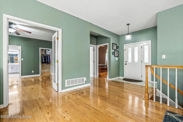 5502 Highpoint Dr, Crestwood, KY 40014 - entrance foyer featuring light wood finished floors, a ceiling fan, and stairway