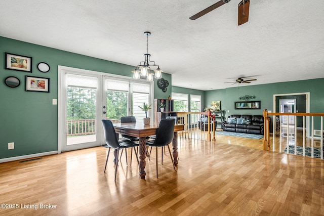 5502 Highpoint Dr, Crestwood, KY 40014 - dining space featuring a ceiling fan, a textured ceiling, and wood finished floors