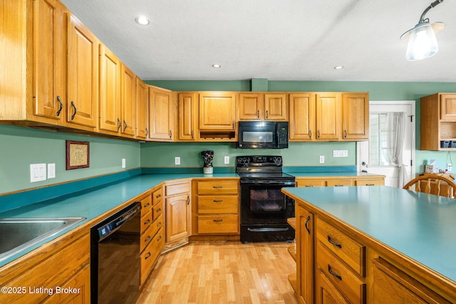 5502 Highpoint Dr, Crestwood, KY 40014 - kitchen with black appliances, light wood finished floors, recessed lighting, and light countertops