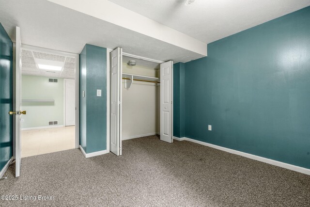 5502 Highpoint Dr, Crestwood, KY 40014 - unfurnished bedroom with carpet flooring, a closet, and a paneled ceiling