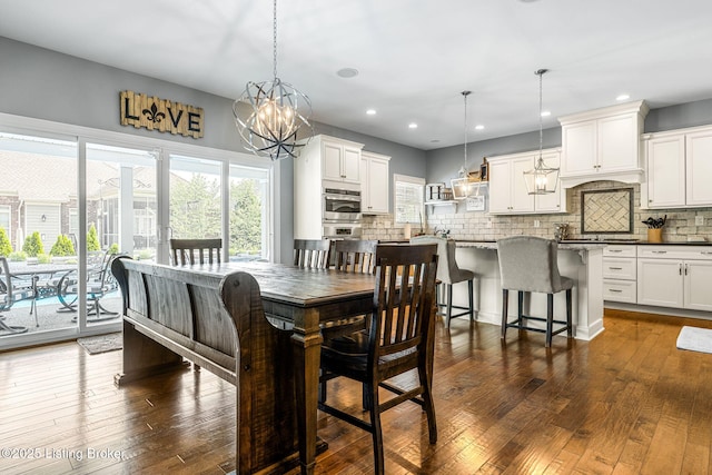 10905 Rock Valley Ct, Louisville, KY 40241 - dining area featuring dark wood-style floors, recessed lighting, and a chandelier