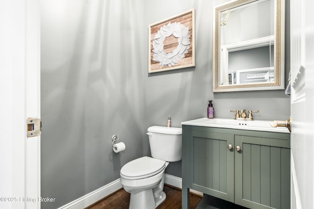 10905 Rock Valley Ct, Louisville, KY 40241 - bathroom featuring toilet, baseboards, wood finished floors, and vanity