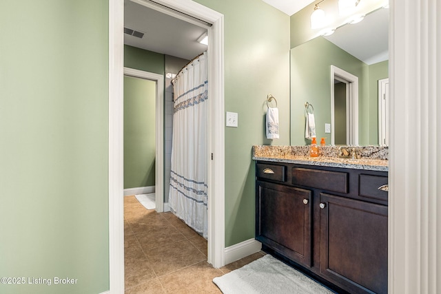 10905 Rock Valley Ct, Louisville, KY 40241 - full bathroom with tile patterned flooring, vanity, and baseboards