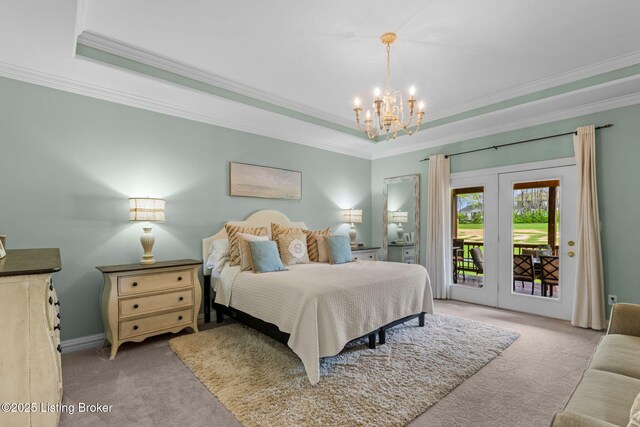 carpeted bedroom with a chandelier, a raised ceiling, crown molding, and access to outside