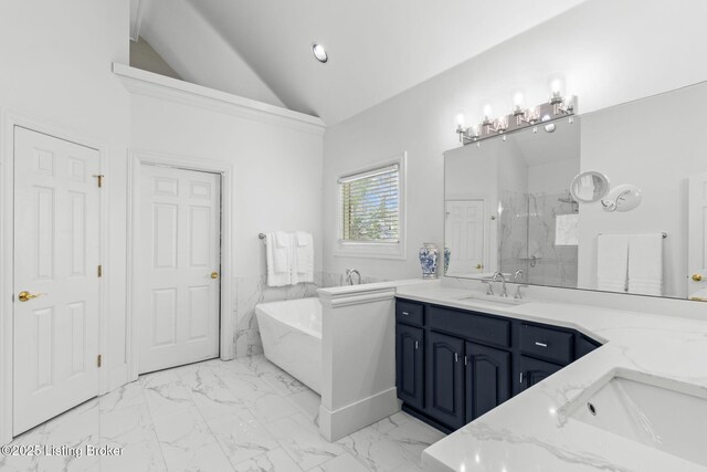 bathroom with a marble finish shower, vanity, marble finish floor, a soaking tub, and lofted ceiling