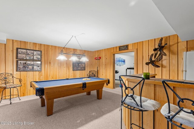 playroom featuring billiards, carpet flooring, and wood walls