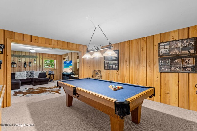 playroom featuring carpet floors, wood walls, and pool table