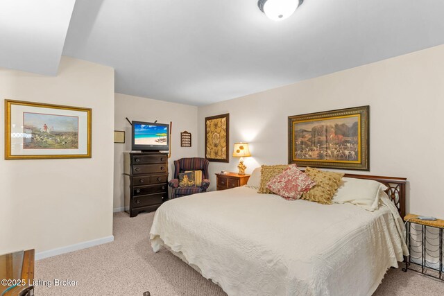 carpeted bedroom with baseboards
