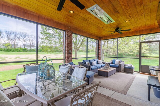 sunroom / solarium featuring an outdoor hangout area, outdoor dining area, and ceiling fan
