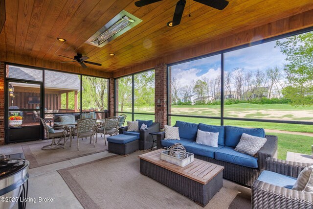 sunroom / solarium featuring ceiling fan, an outdoor hangout area, and outdoor dining area