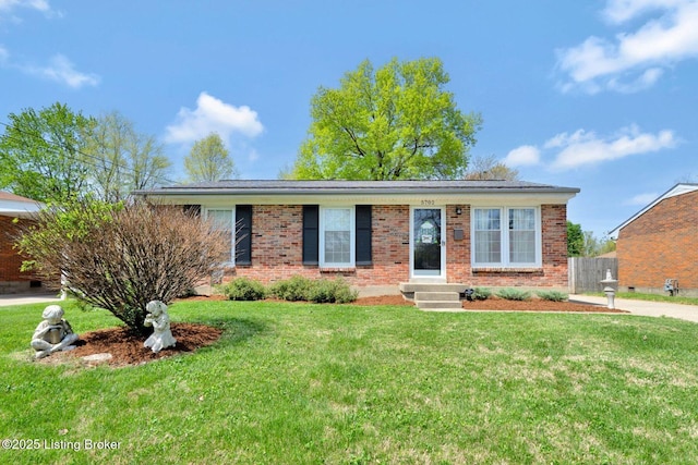 ranch-style house with a front lawn, fence, and brick siding