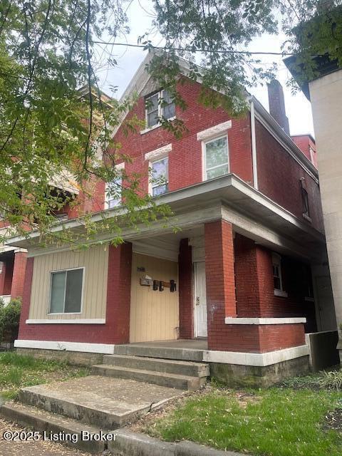 210 E Ormsby Ave, Louisville, KY 40203 - view of front of house featuring brick siding
