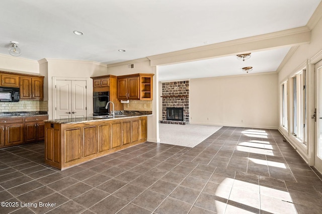 2605 Evergreen Wynde, Louisville, KY 40223 - kitchen with black microwave, open floor plan, crown molding, and backsplash