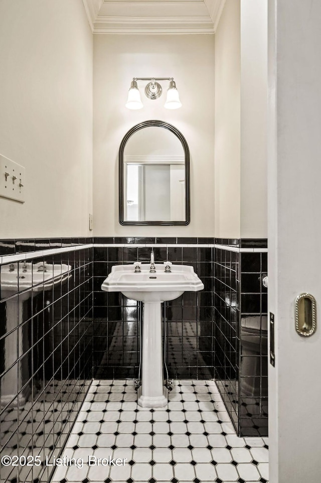 2605 Evergreen Wynde, Louisville, KY 40223 - bathroom featuring tile walls, ornamental molding, a wainscoted wall, and tile patterned floors