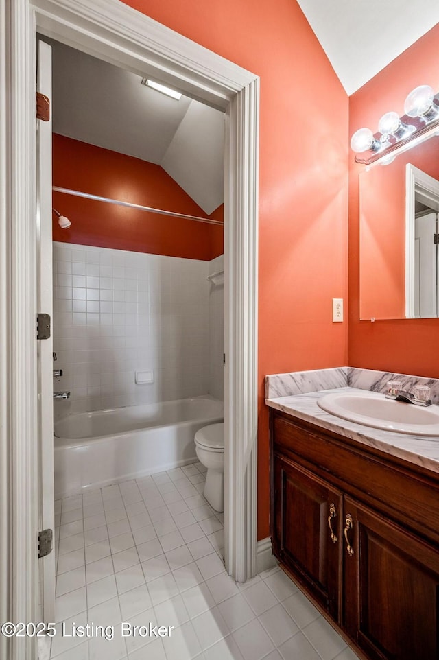 2605 Evergreen Wynde, Louisville, KY 40223 - bathroom featuring tile patterned flooring, bathtub / shower combination, vaulted ceiling, toilet, and vanity