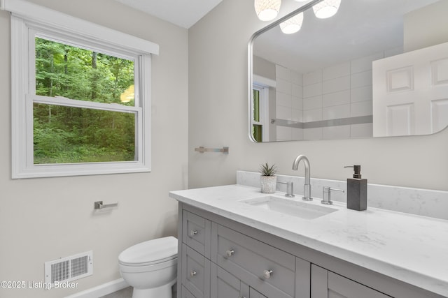 1907 Charbdin Pl, Louisville, KY 40207 - bathroom featuring vanity, toilet, and baseboards