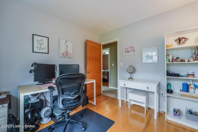 office space with wood finished floors