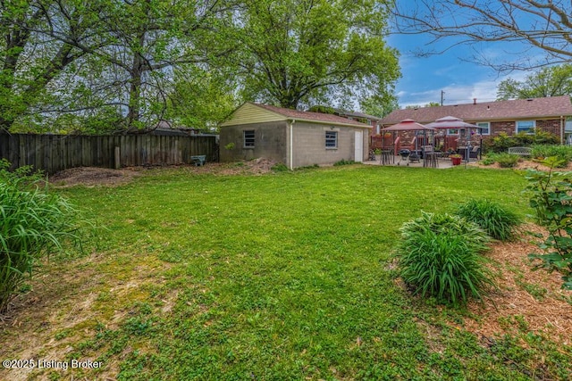 view of yard with a fenced backyard, a patio, and a gazebo