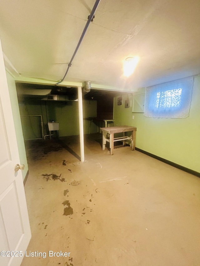 basement featuring a sink