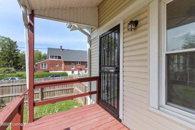 wooden deck featuring fence