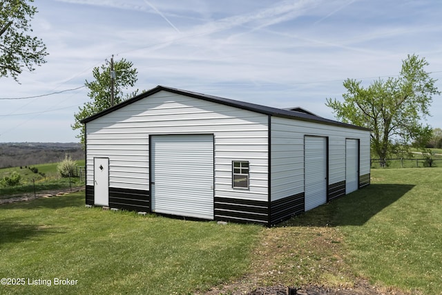 view of outbuilding featuring fence and an outbuilding