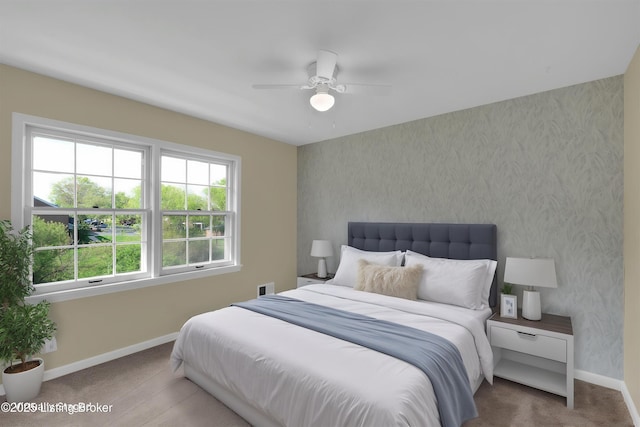bedroom with baseboards, wallpapered walls, a ceiling fan, and carpet flooring