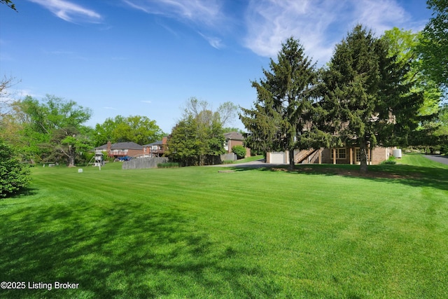 view of yard with fence