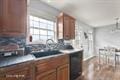 kitchen with brown cabinets