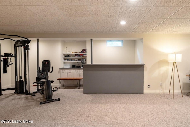 workout area featuring recessed lighting, carpet flooring, and baseboards
