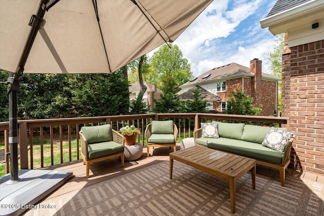 deck with an outdoor hangout area