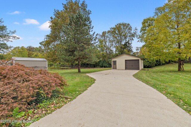 150 Joy St, Lawrenceburg, KY 40342 - exterior space featuring an outdoor structure, a front yard, a garage, and fence