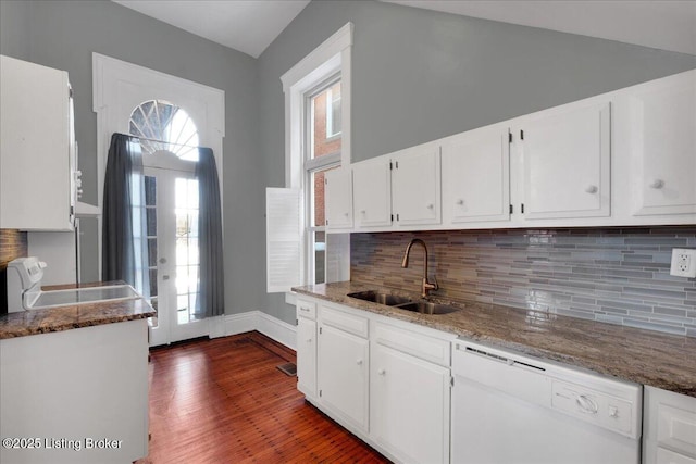 1460 S 6th St, Louisville, KY 40208 - kitchen with decorative backsplash, white cabinets, dishwasher, a sink, and dark wood-style floors