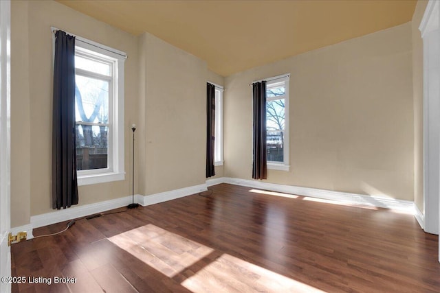 1460 S 6th St, Louisville, KY 40208 - empty room with baseboards and wood finished floors