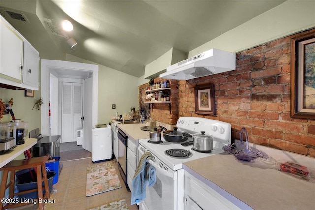 1460 S 6th St, Louisville, KY 40208 - kitchen with white range with electric stovetop, brick wall, white cabinets, and under cabinet range hood