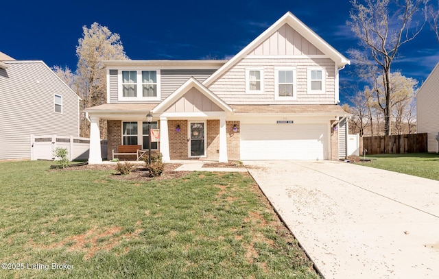 craftsman-style home featuring brick siding, a garage, board and batten siding, and fence