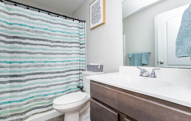bathroom with vanity, toilet, and a shower with curtain