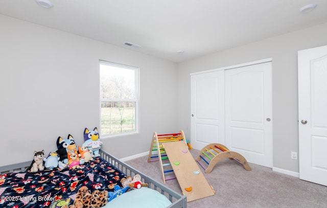 rec room featuring visible vents, carpet, and baseboards