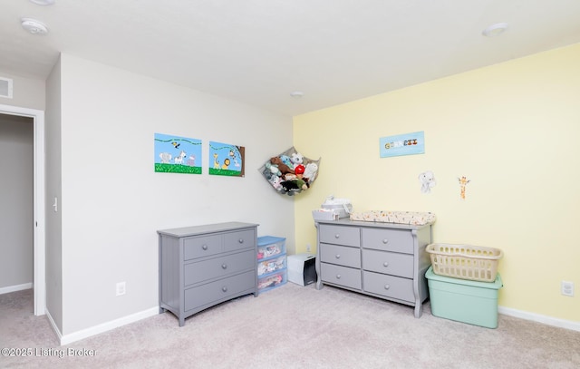 bedroom featuring visible vents, carpet flooring, and baseboards
