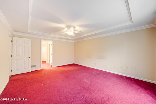 unfurnished room with a ceiling fan, ornamental molding, and baseboards