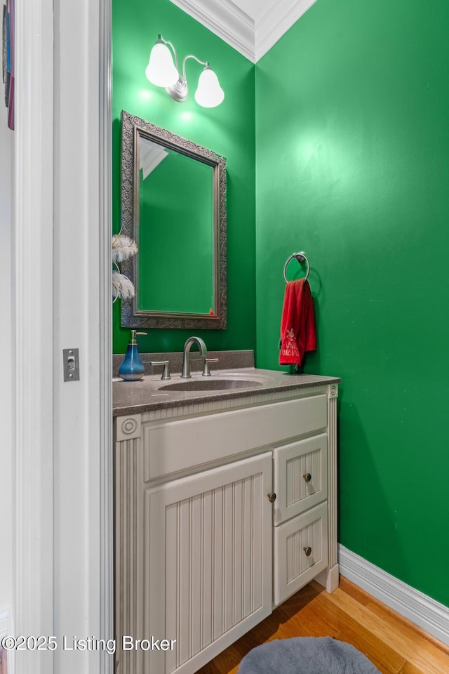 14729 Forbes Cir, Louisville, KY 40245 - bathroom featuring crown molding, vanity, wood finished floors, and baseboards
