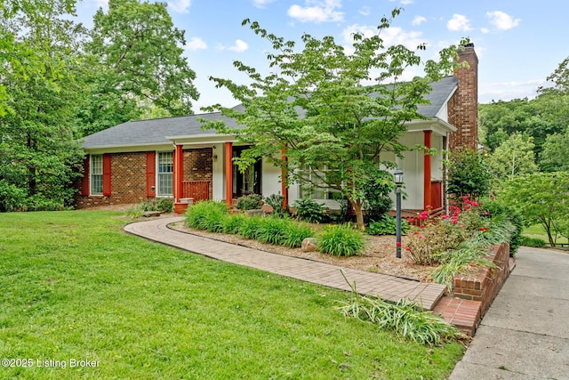 9111 Royal Oak Dr, Louisville, KY 40272 - view of front of property with a front yard, a chimney, a shingled roof, and brick siding