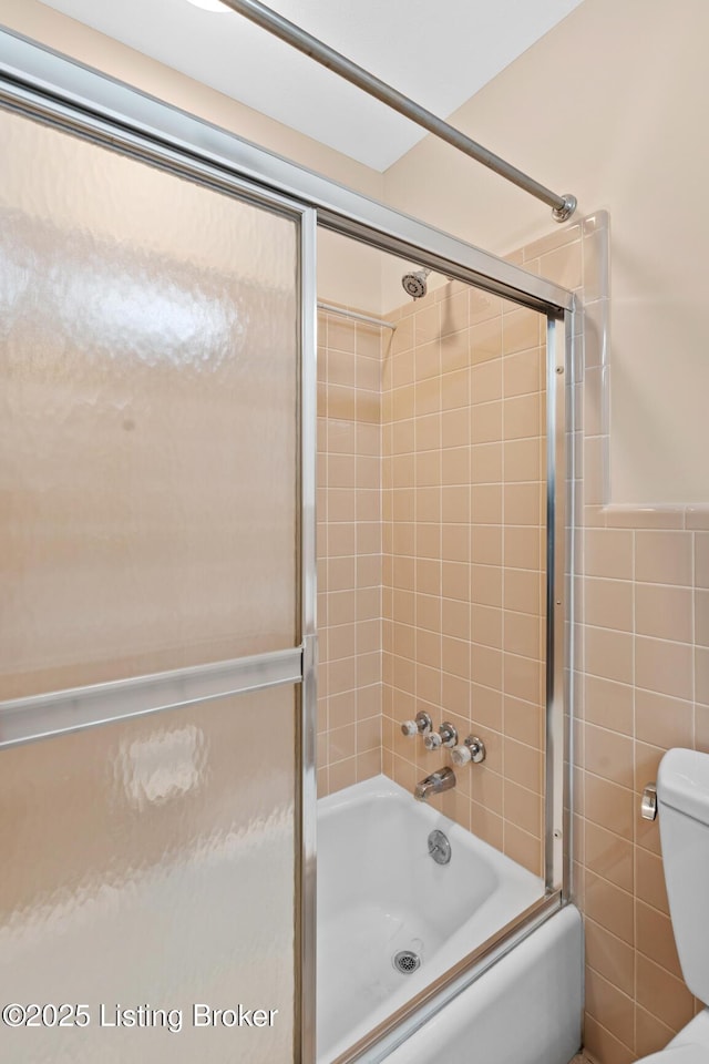 9111 Royal Oak Dr, Louisville, KY 40272 - full bath with enclosed tub / shower combo, toilet, and tile walls